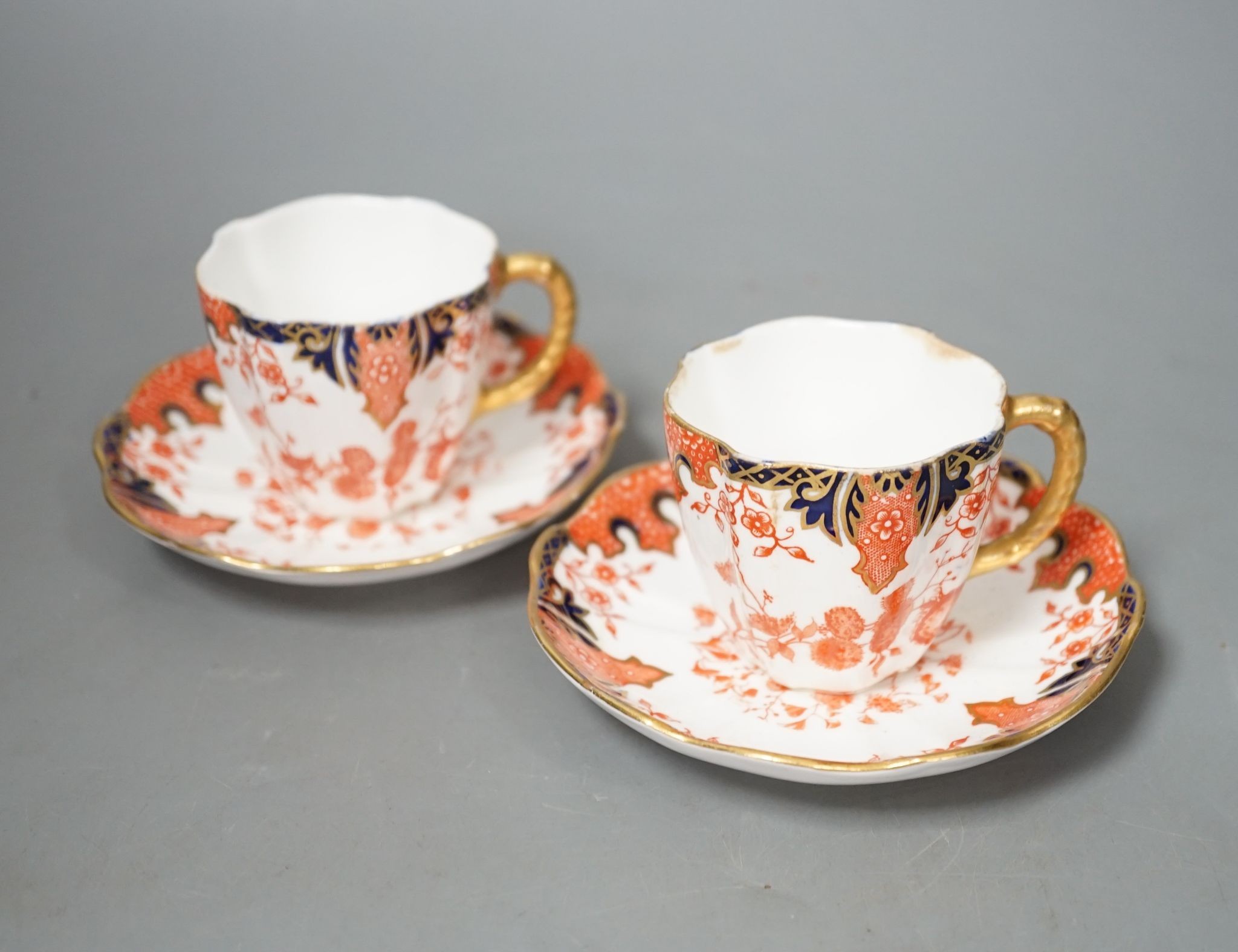 Eleven Royal Crown Derby porcelain Imari pattern 2712 coffee cups and twelve saucers